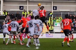 Elijah Adebayo wins a header
