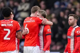 Alfie Doughty is congratulated