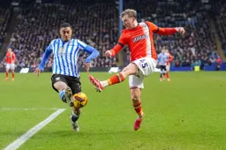 Alfie Doughty sees his cross blocked