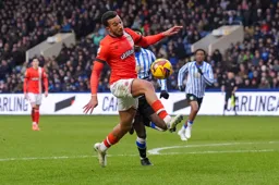 Jacob Brown tries to get free