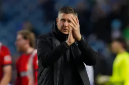 Richard Thomas salutes the away fans