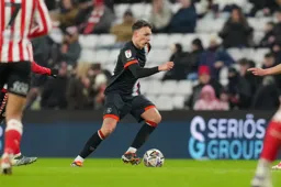 Kal Naismith advances with the ball