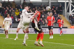 Elijah Adebayo receives close attention