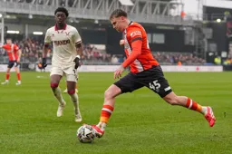 Alfie Doughty swings over a cross