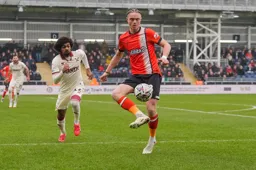 Thelo Aasgaard cushions the ball