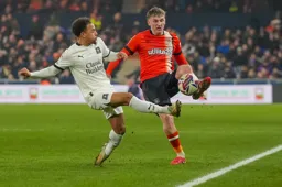 Alfie Doughty gets to the ball first