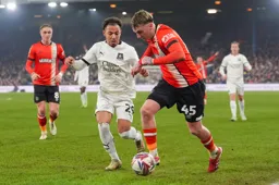 Alfie Doughty looks to beat his full-back