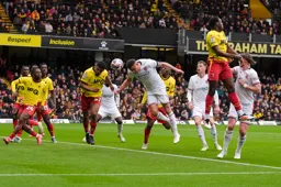 Carlton Morris gets his head to the ball