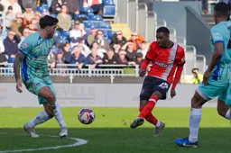 Isaiah Jones plays the ball forwards