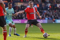 Thelo Aasgaard shields the ball