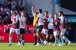 Kal Naismith is shown the red card