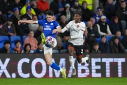 Isaiah Jones in a chase for the ball