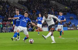 Millenic Alli fires in a shot