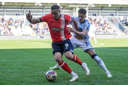 Carlton Morris battles away