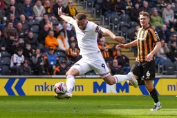 Carlton Morris acrobatically controls the ball