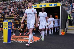 The Luton players take the field