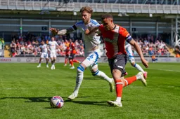 Carlton Morris battles away