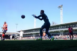 Thomas Kaminski safely gathers the ball