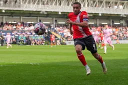 Carlton Morris chases down the ball