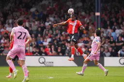 Teden Mengi heads clear