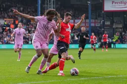 Lasse Nordas battles for the ball