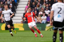 Kal Naismith clears a Derby attack