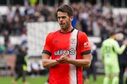 Lasse Nordas applauds the Town fans