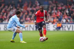 Amari'i Bell slips the ball forwards