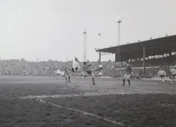 A Crewe defender clears from Ian Buxton