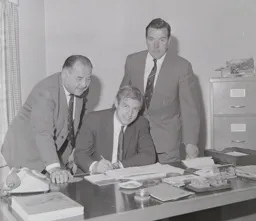 Brian Lewis signs 68-69