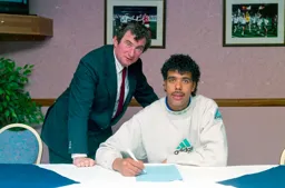 Chris Kamara signs