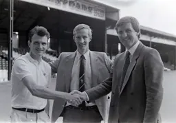 Jim Ryan, John Moore, Ray Harford 86-87