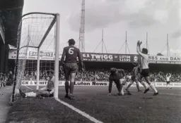 Don Givens celebrates a Macdonald goal