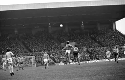 Jimmy Husband beaten to the ball