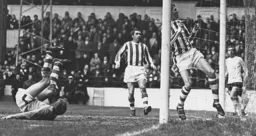 The ball goes over the bar